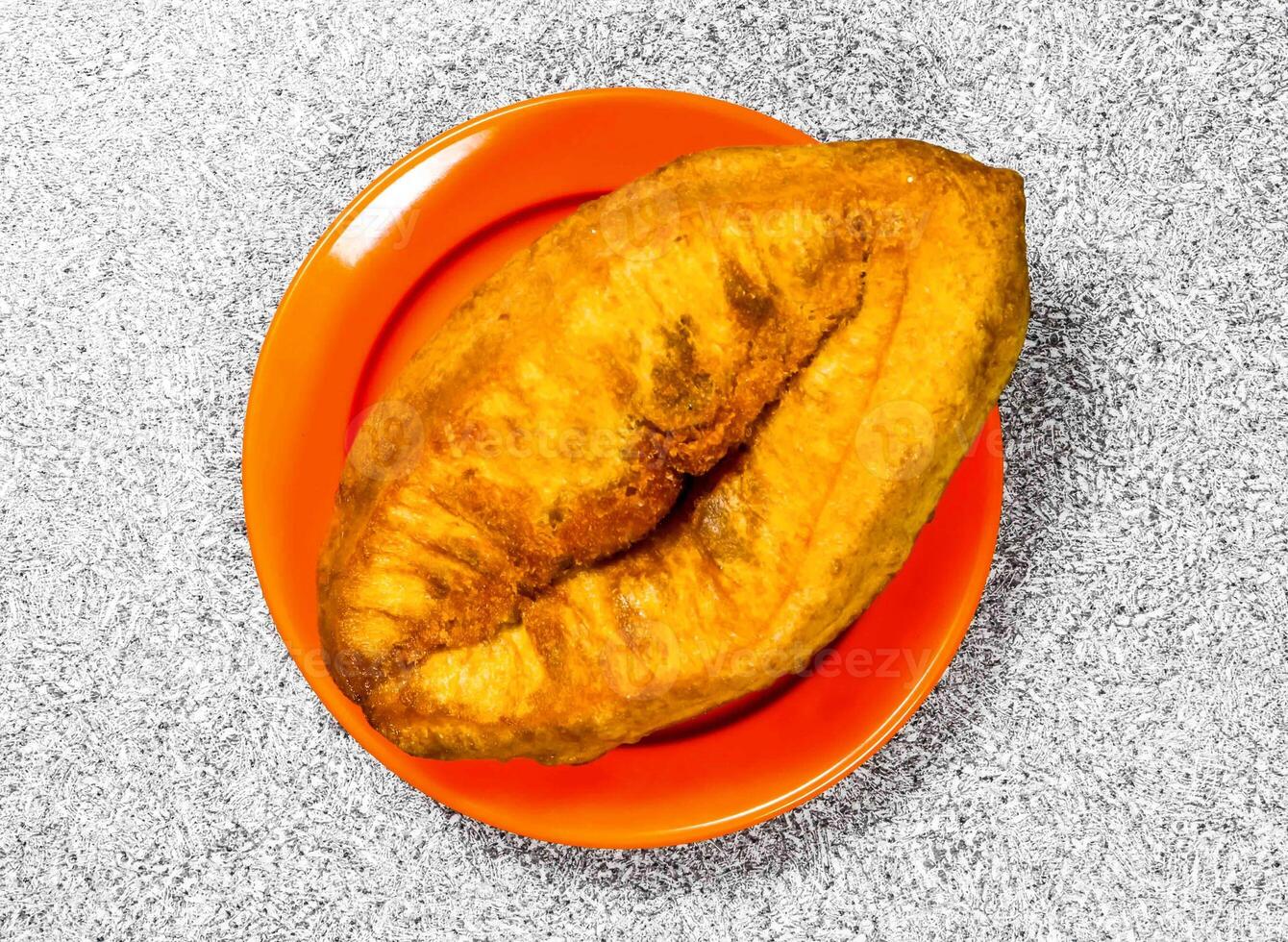 Beef leg crispy served in bowl isolated on background top view of hong kong food photo