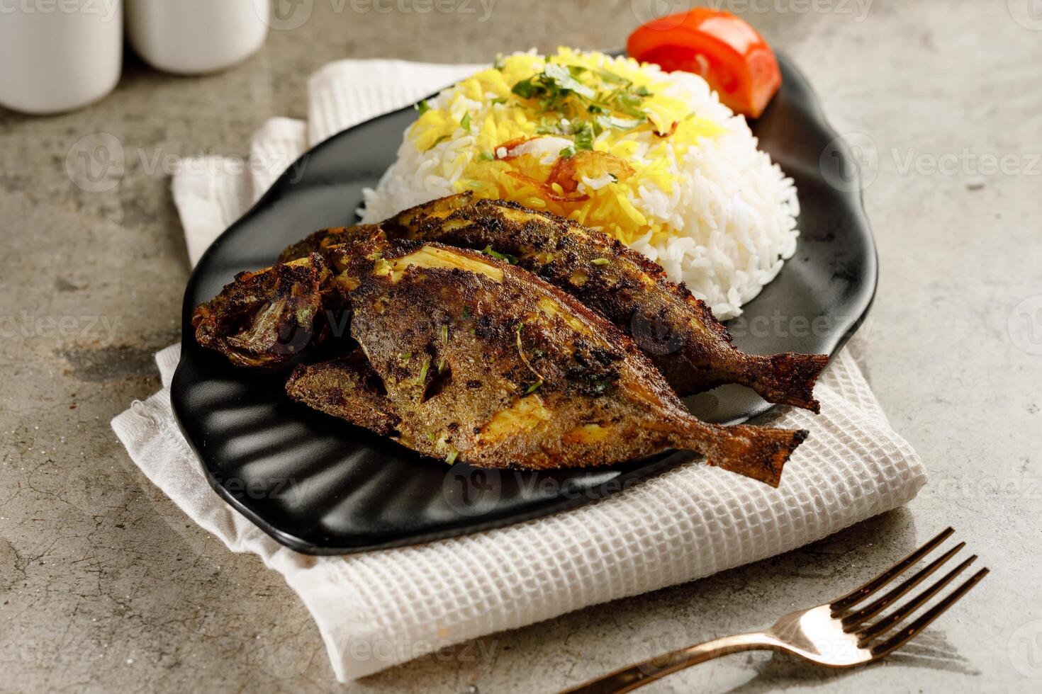 Safi Fish with White Rice served in a dish isolated on grey background side view fast food photo