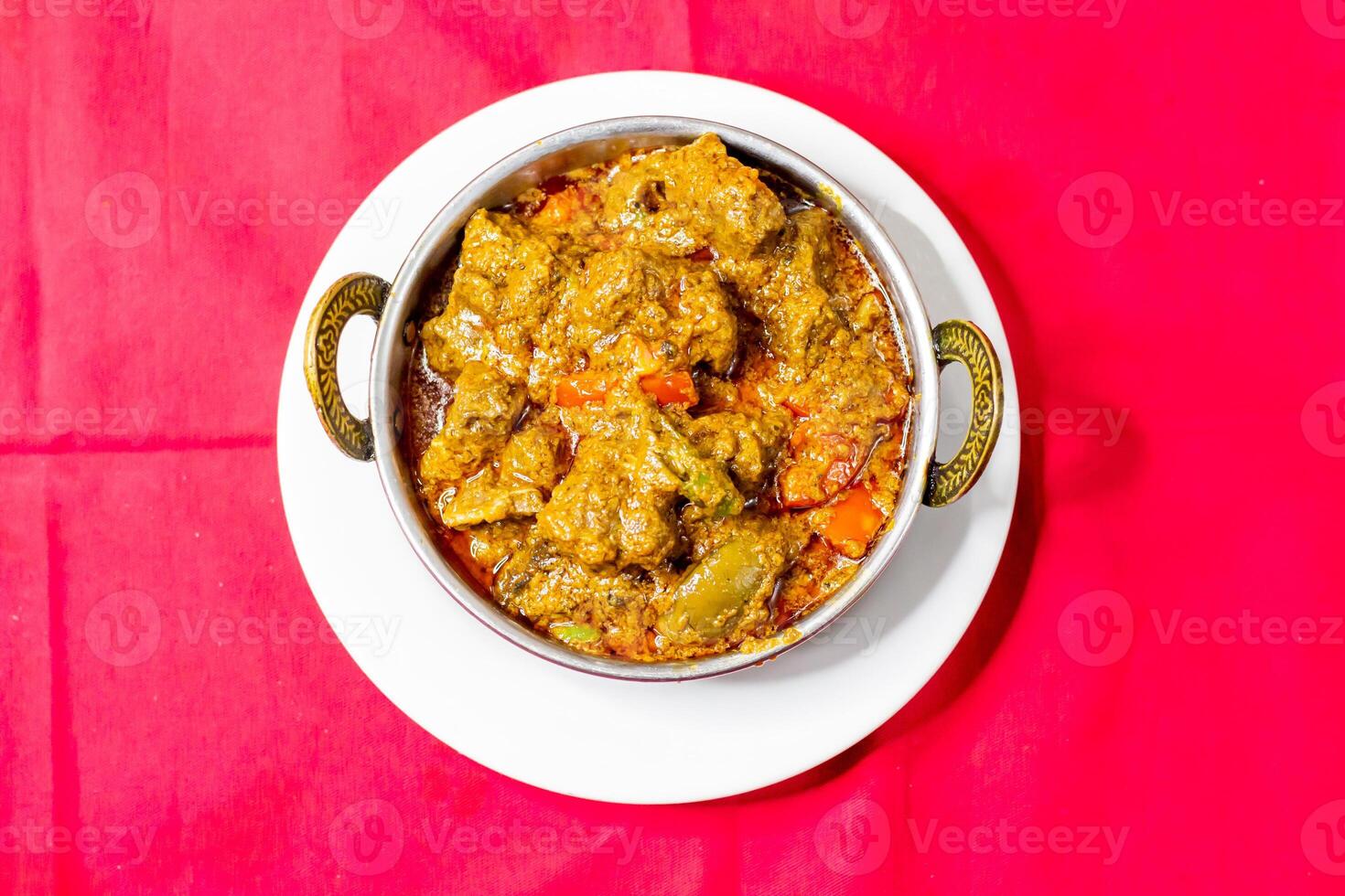 mutton karahi, Indian Lamb Curry, mutton bhuna masala served in karahi top view of pakistani food photo