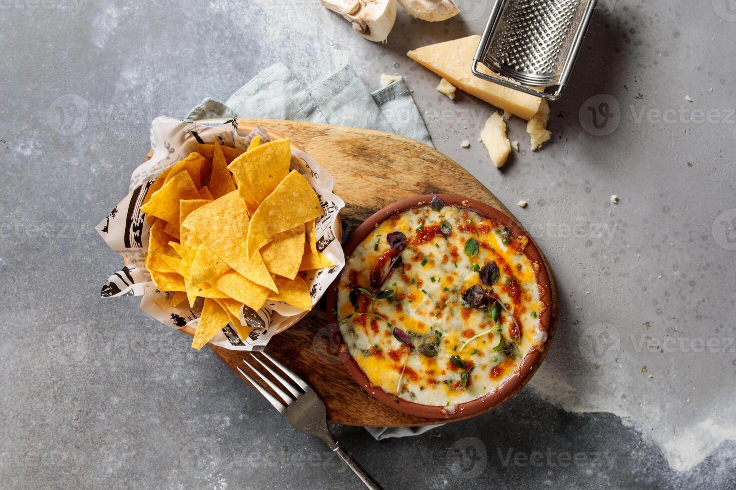 Original Gratin with snacks served in dish isolated on table top view of arabic breakfast photo