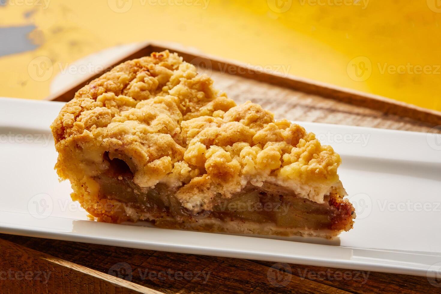 Arab Apple Pie Slice served in dish isolated on wooden table top view of arabic sweet dessert photo