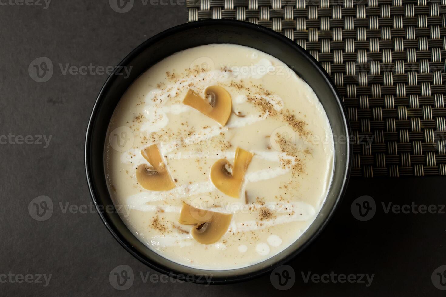 Creamy Mushroom Soup served in bowl isolated on background top view of bangladesh and indian food photo