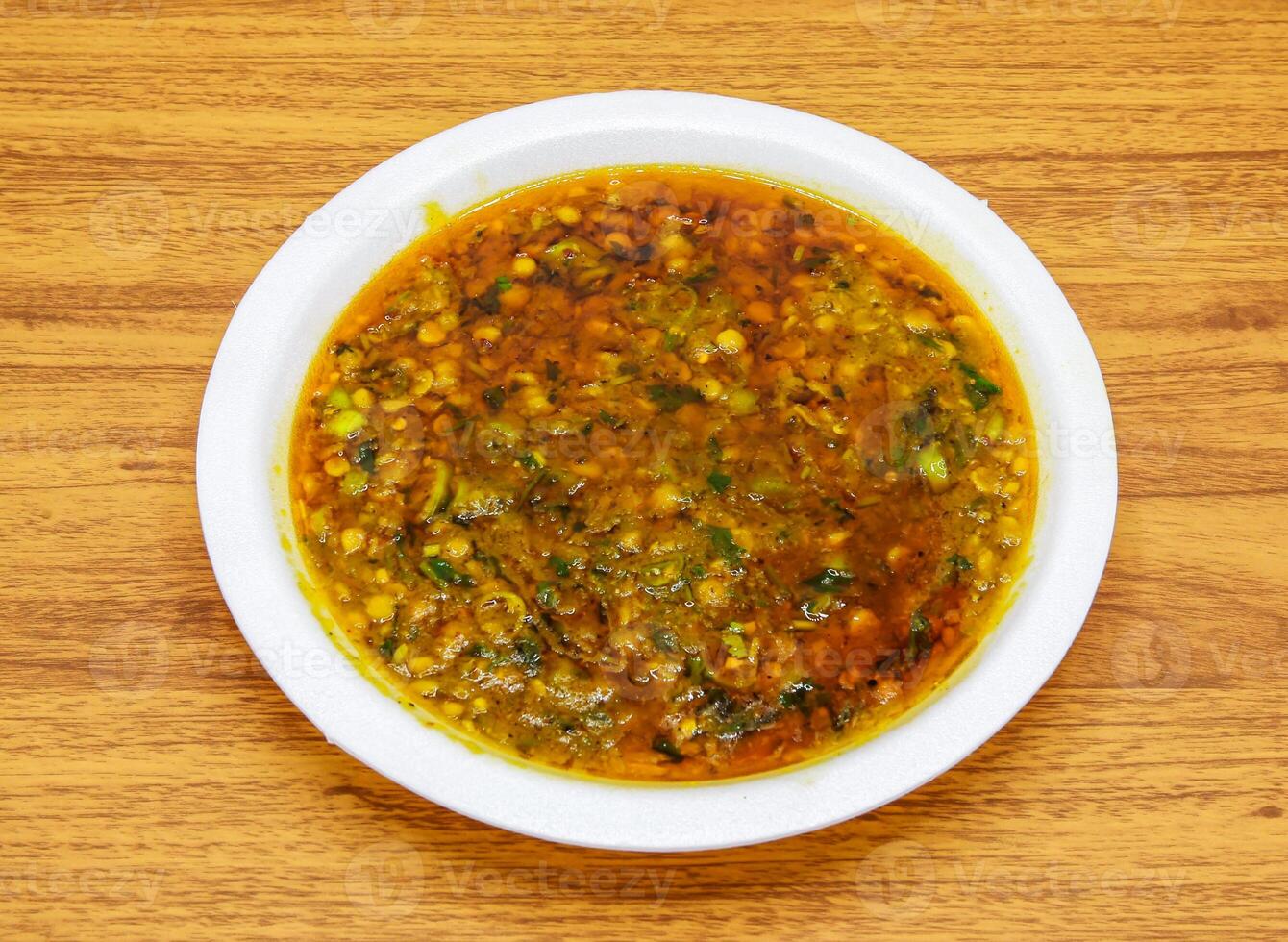 dal chana fry served in plate isolated on table top view of indian and pakistani spicy food photo