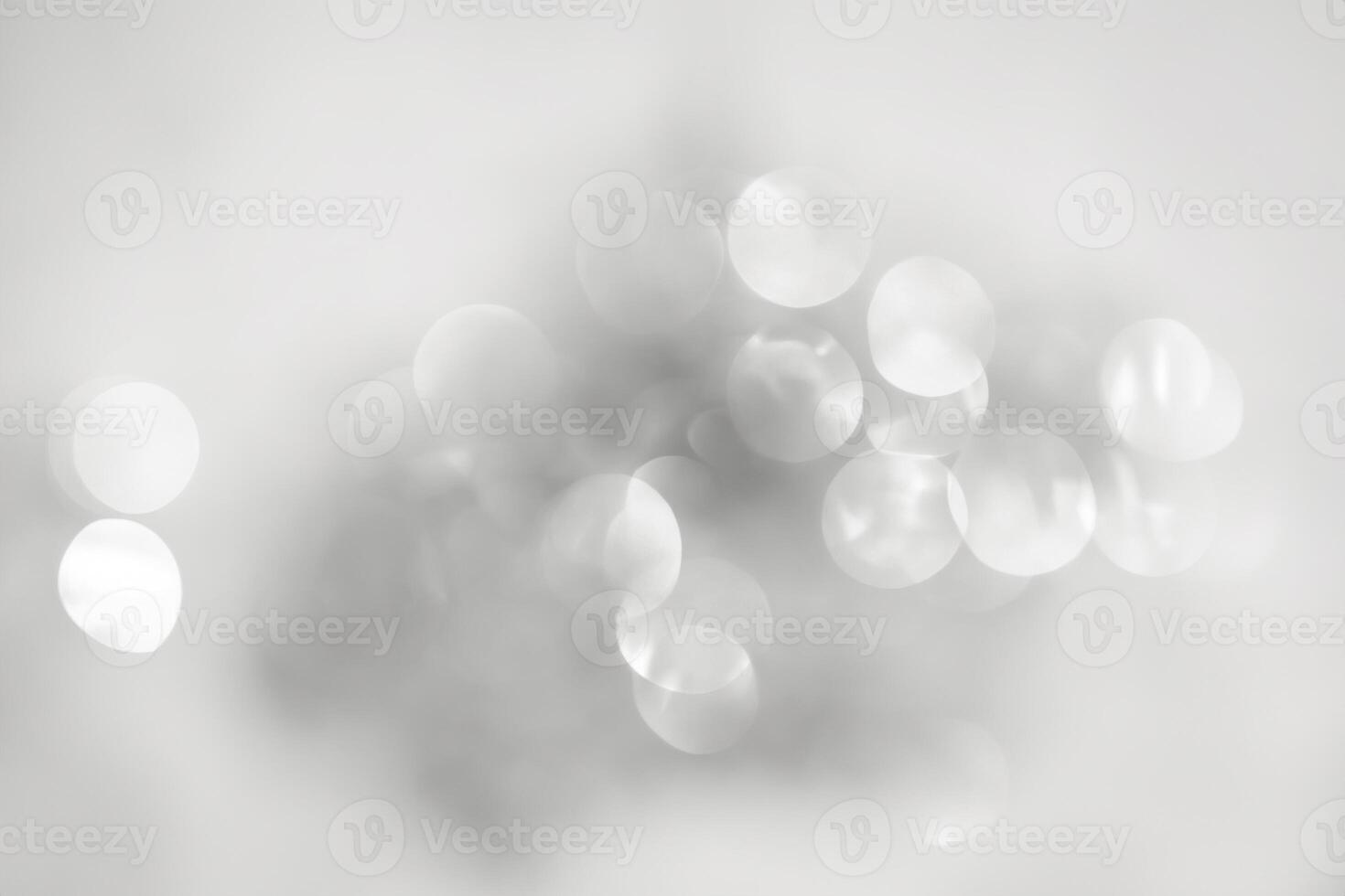 Enchanting Bokeh Christmas Lights on Abstract White Background. photo