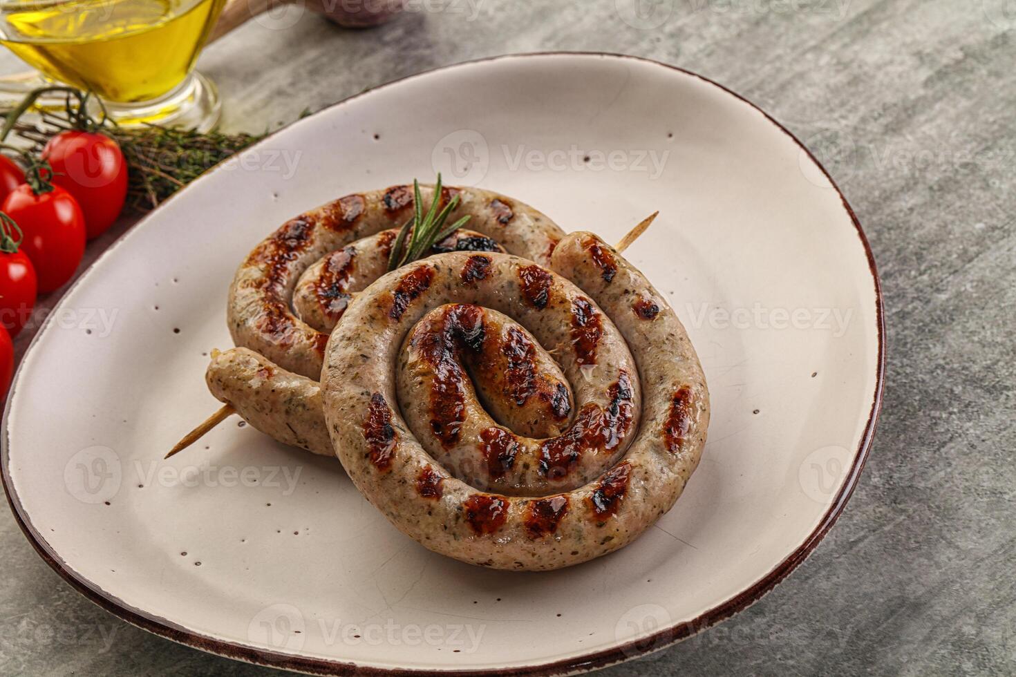 Grilled natural spiral meat sausage photo