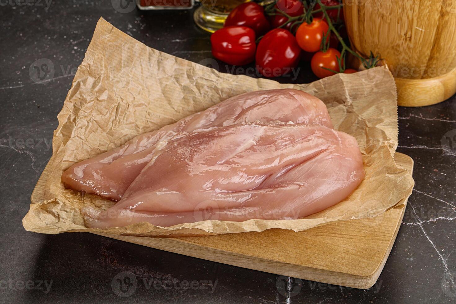 Raw chicken breast fillet for cooking photo
