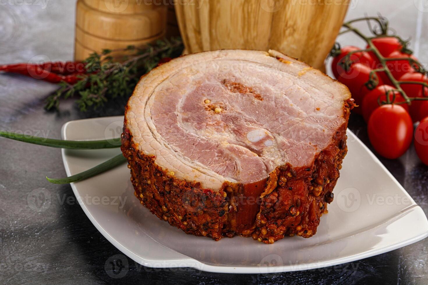 Tasty and fat smoked pork belly photo