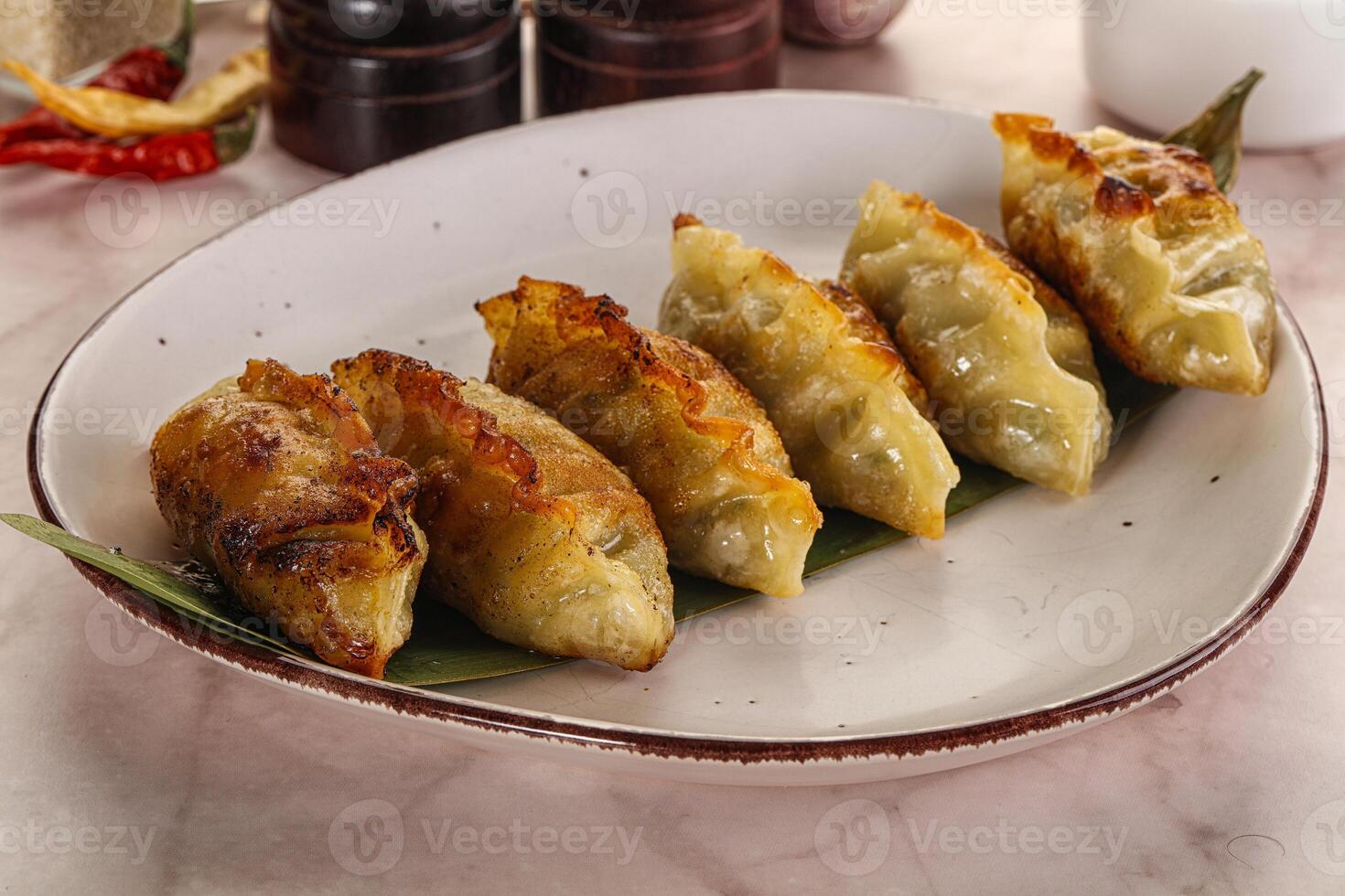 Fried Japanese stuffed dumplings - Gyoza photo