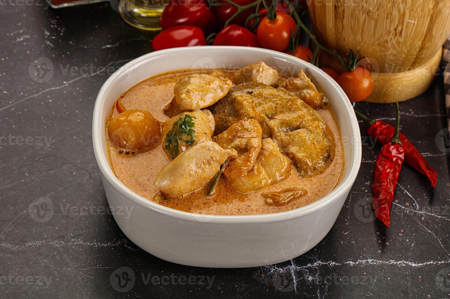 Thai Tom yum soup with chicken photo