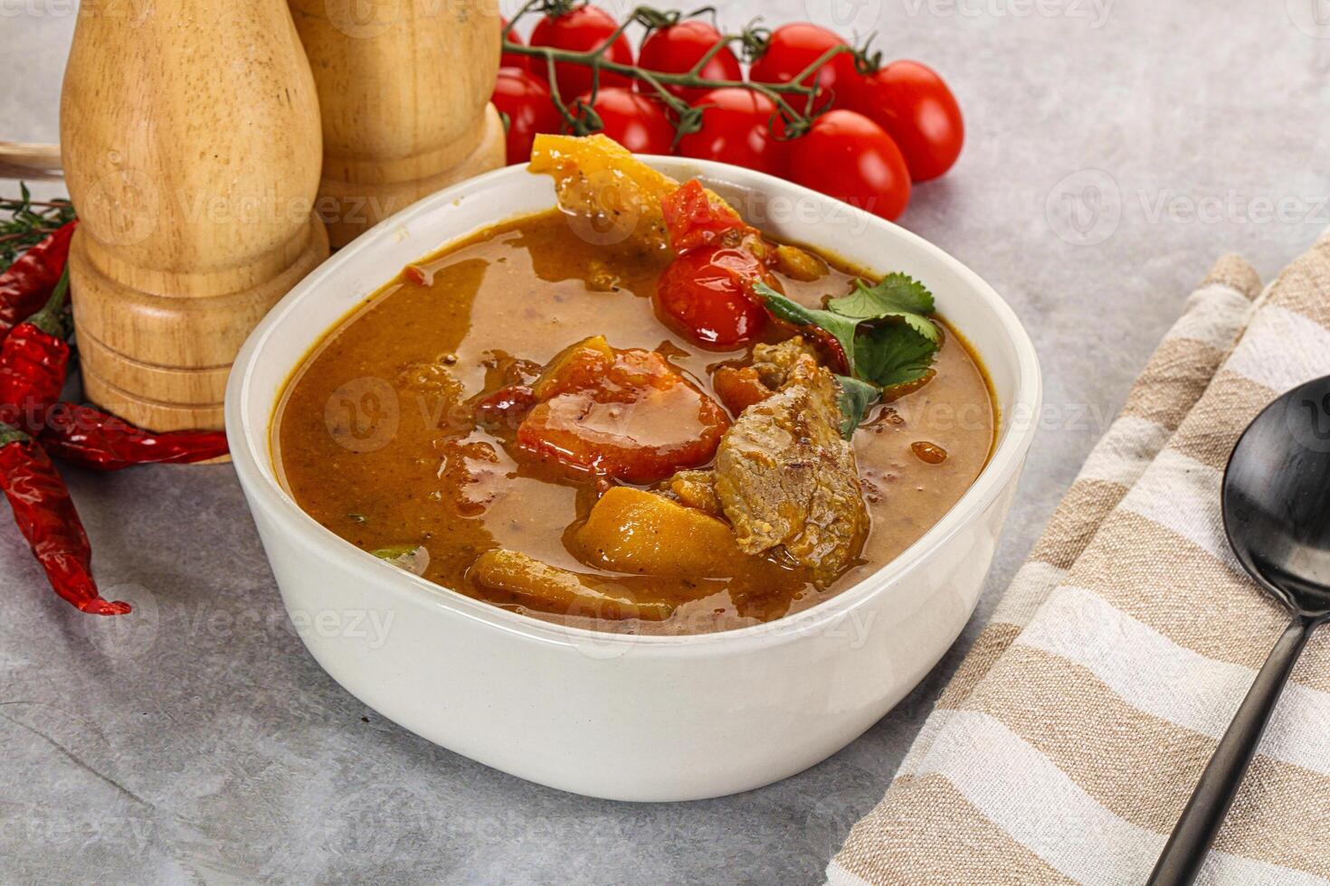 Yellow Thai curry with beef photo