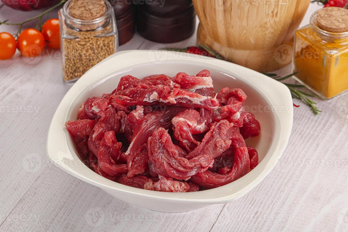 Raw beef meat - sliced strips photo