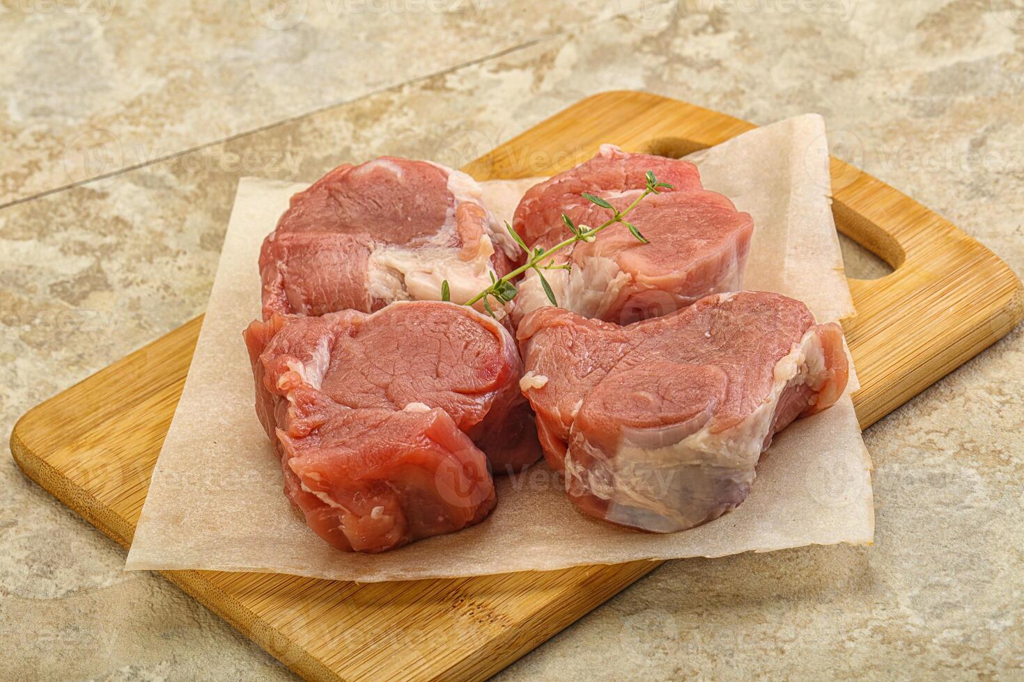 Raw pork tenderloin for cooking photo