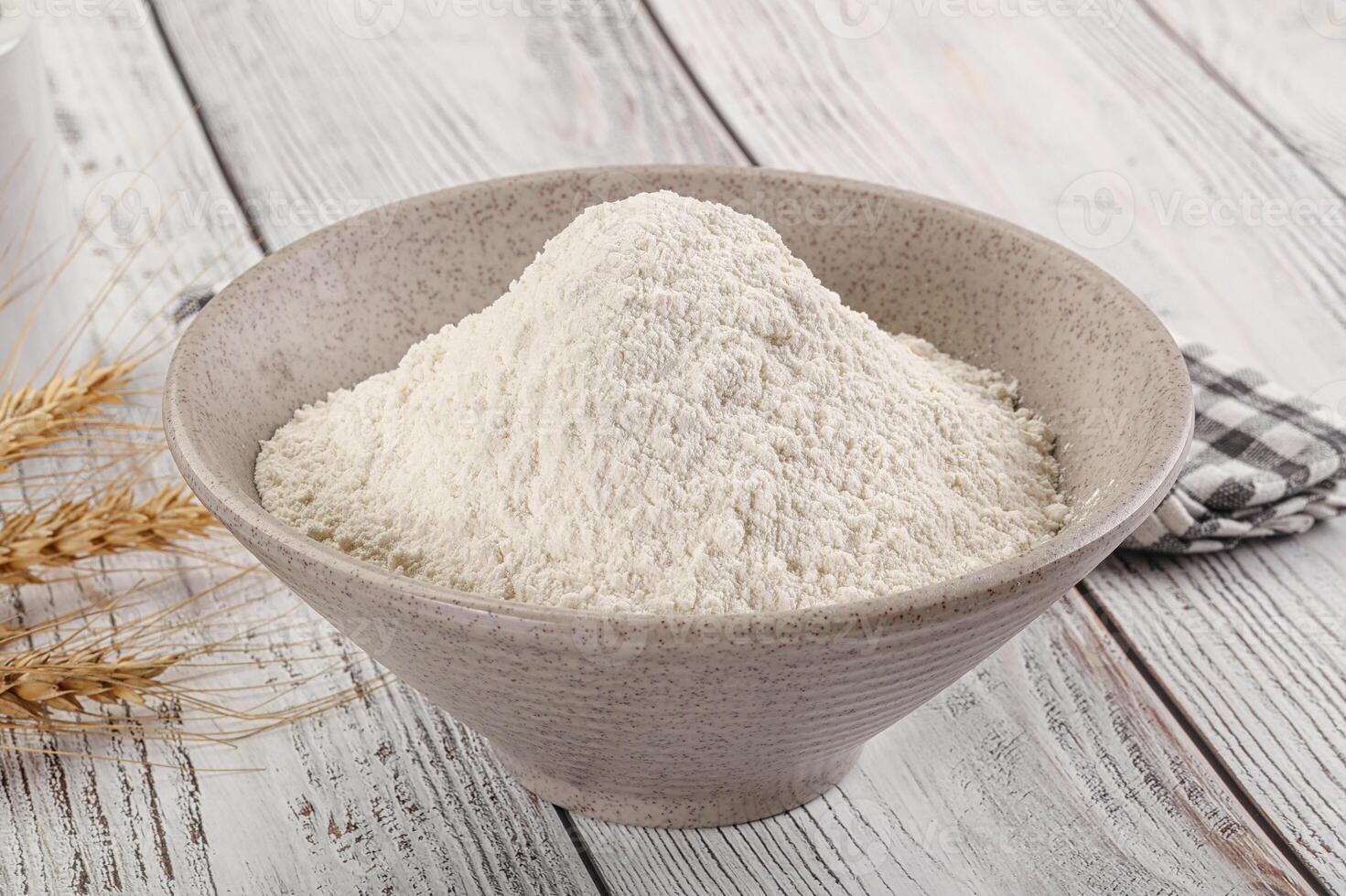 Wheat flour heap for bake photo