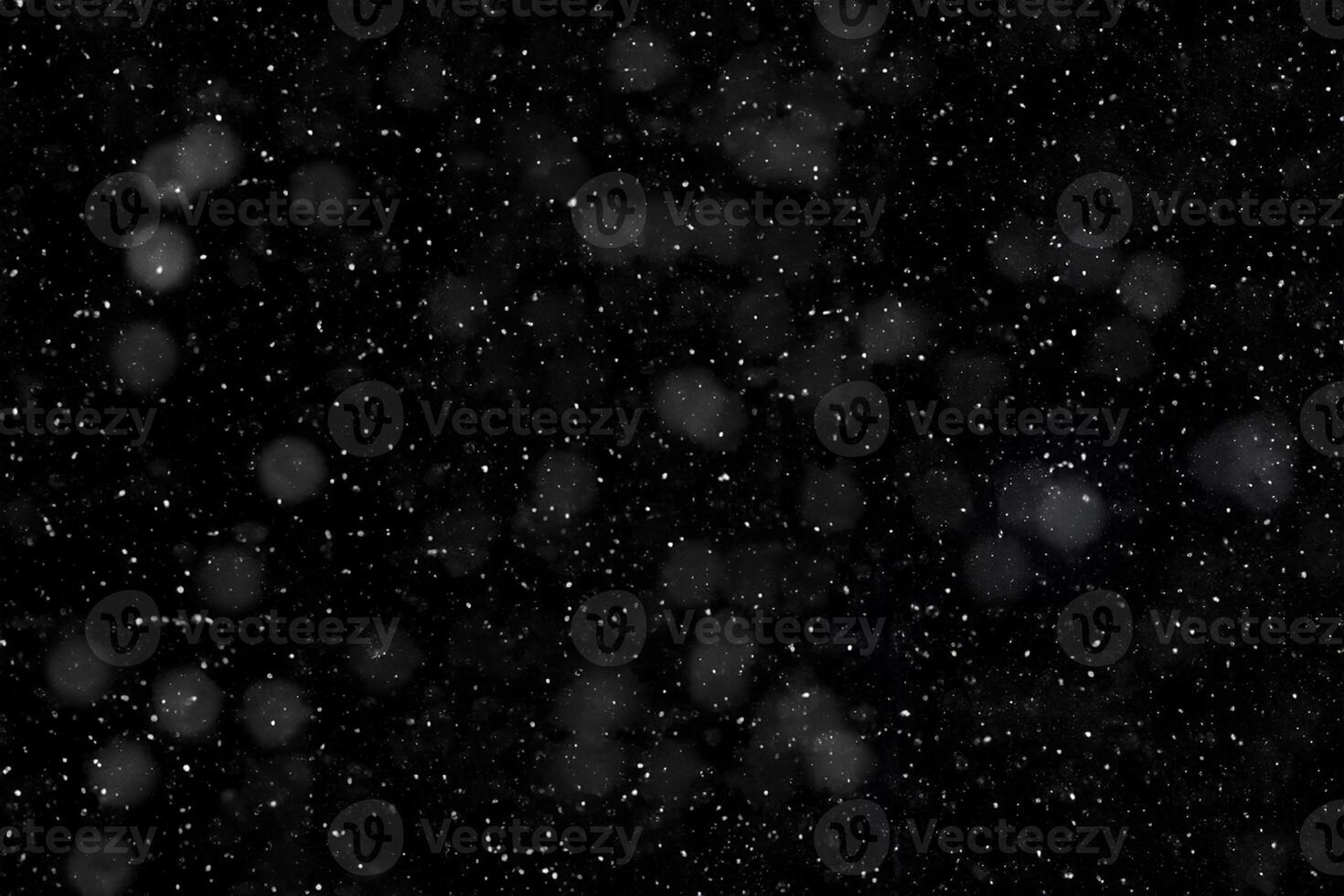 Snowfall on Black Background, Texture Overlay for Winter Designs photo