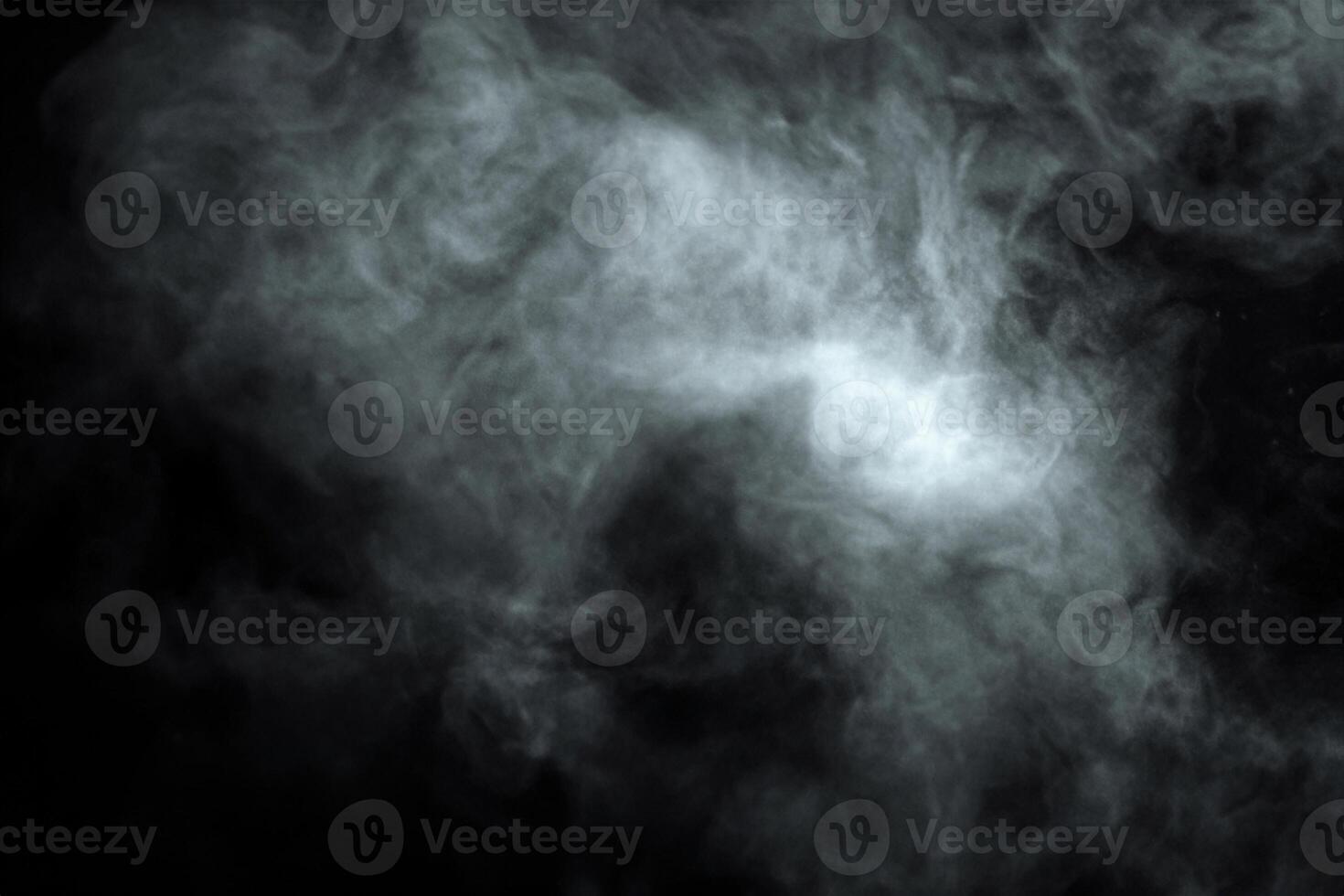 Abstract Powder or Smoke Suspended in Darkness, Isolated on Black Background. photo