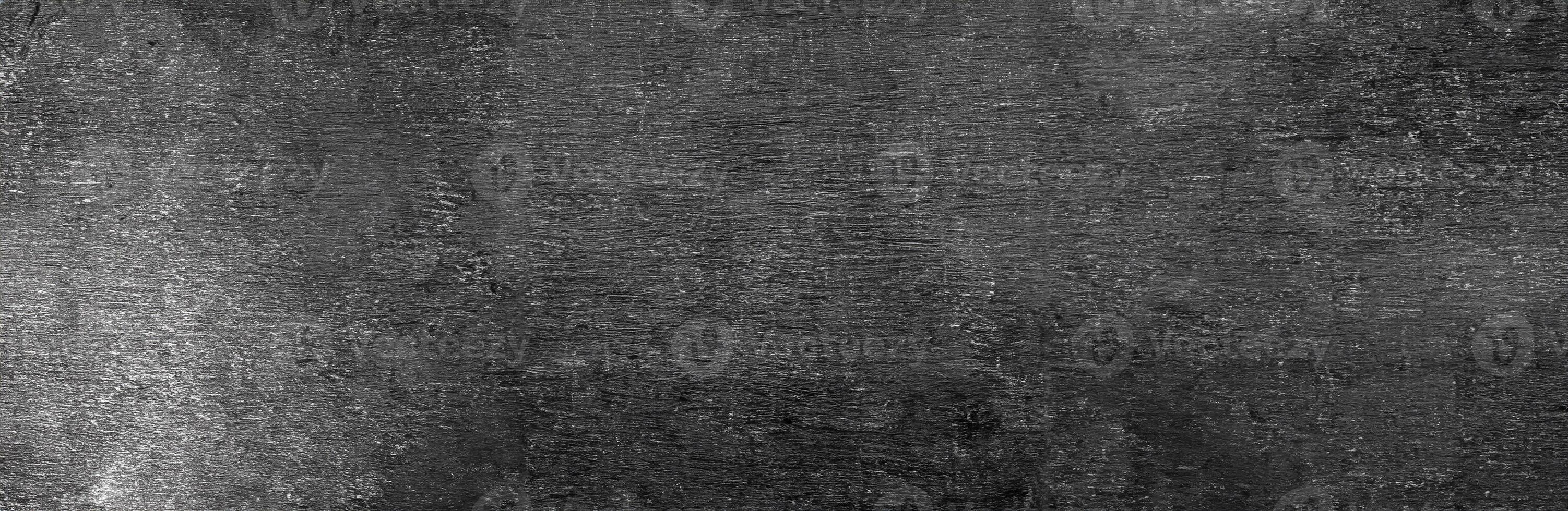 Black Friday Deals Await, Blank Screen with Chalk Text on Chalkboard Background in College Setting. photo