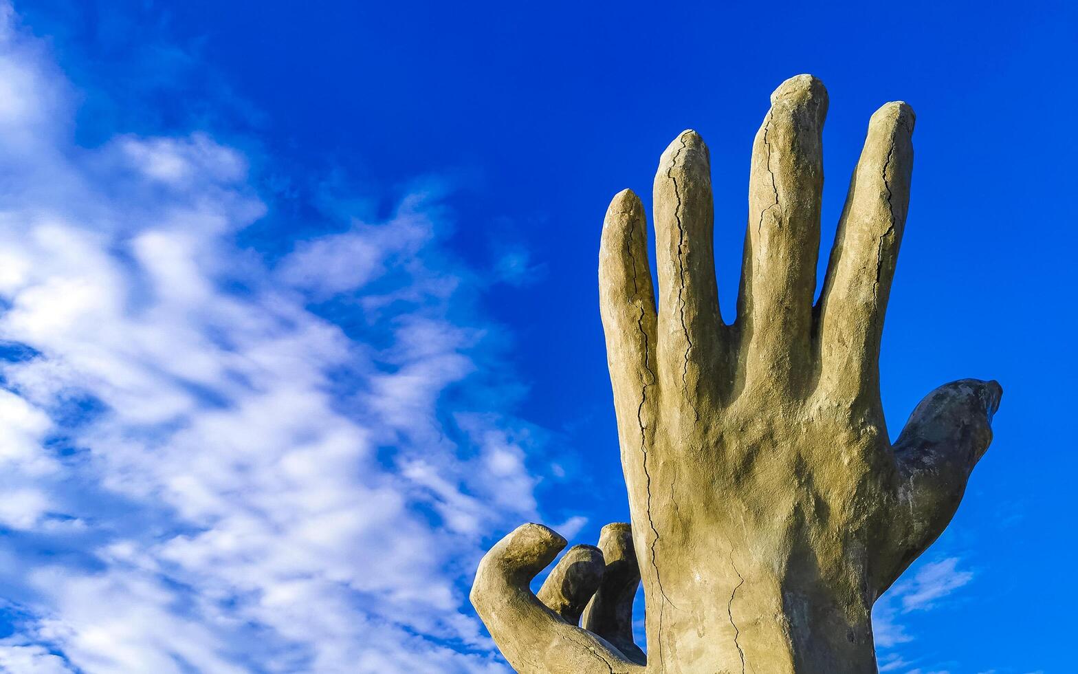 Puerto Escondido Oaxaca Mexico 2022 Hands stone rock statue sculpture beach Puerto Escondido Mexico. photo