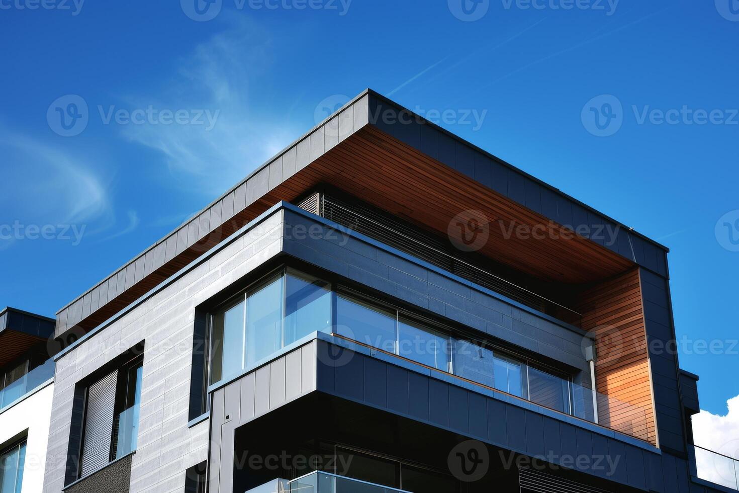 AI generated A sleek slate gray house against the backdrop of a clear blue sky photo