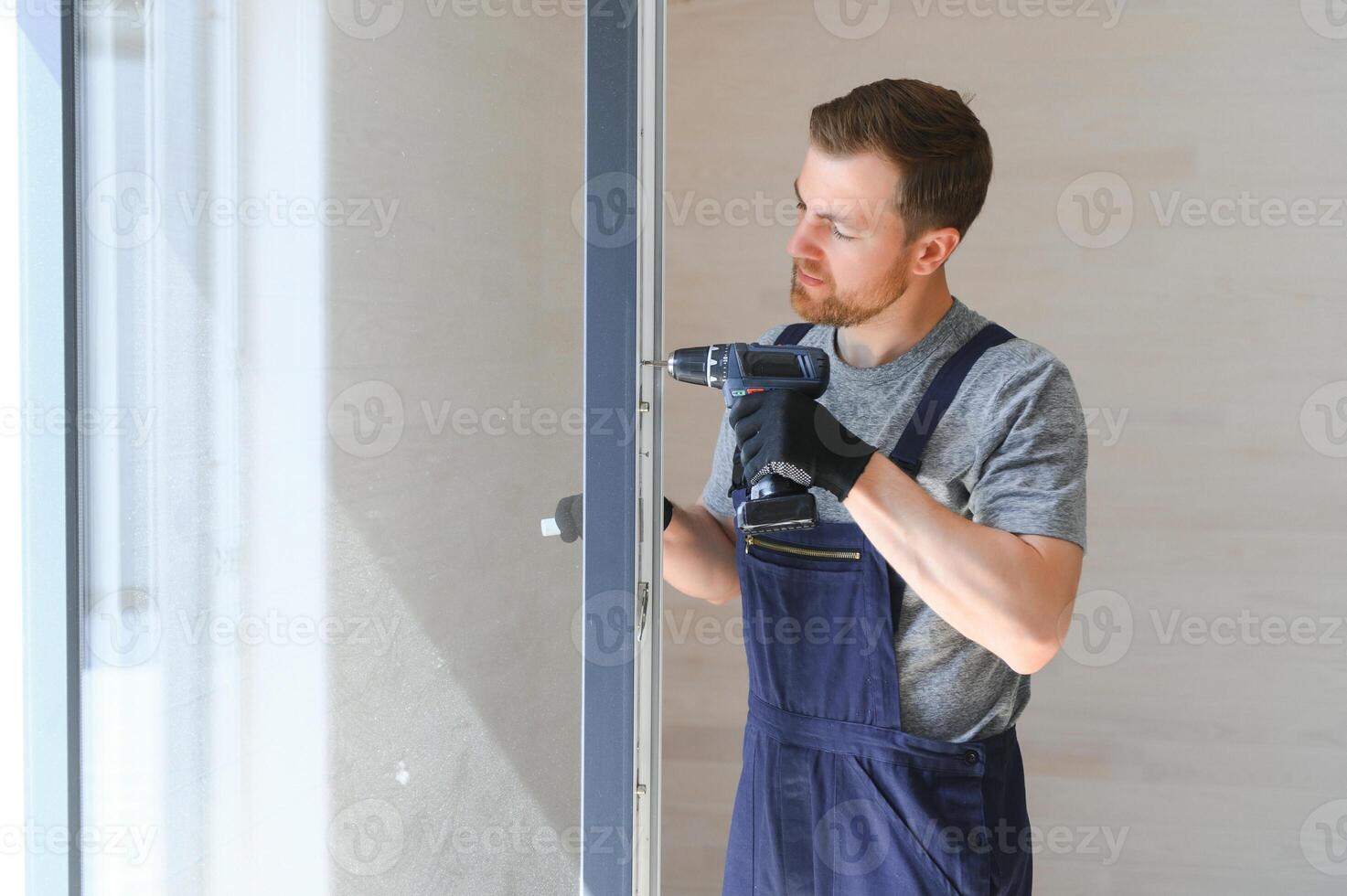 Process of construction new and modern modular house from composite sip panels. Worker man in special protective uniform wear working on building development industry of energy efficient property. photo
