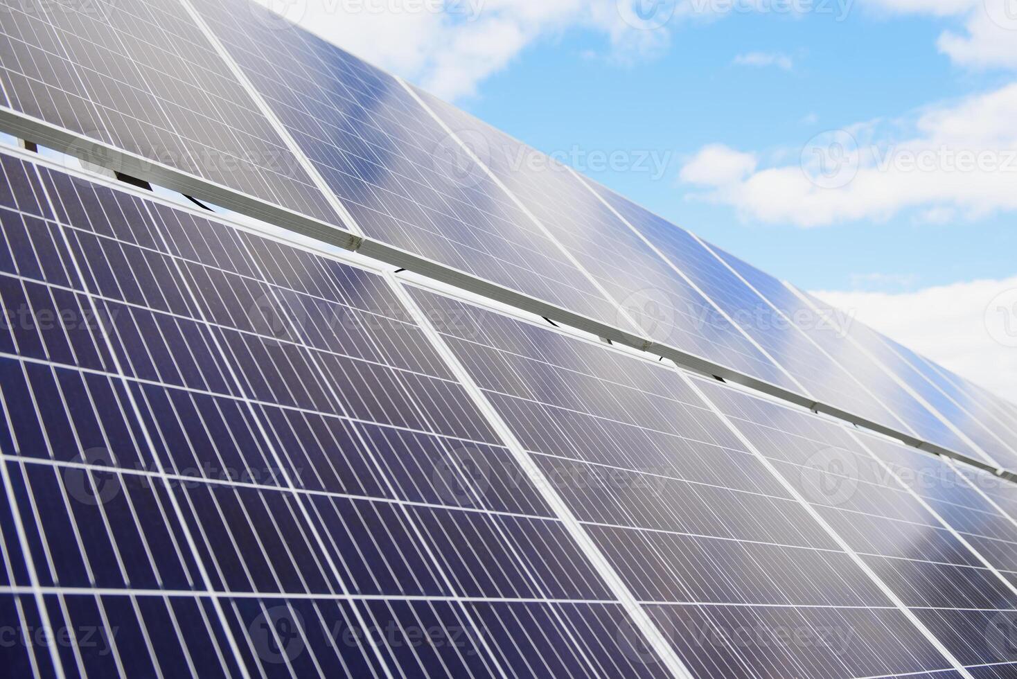 Solar panel against blue sky photo