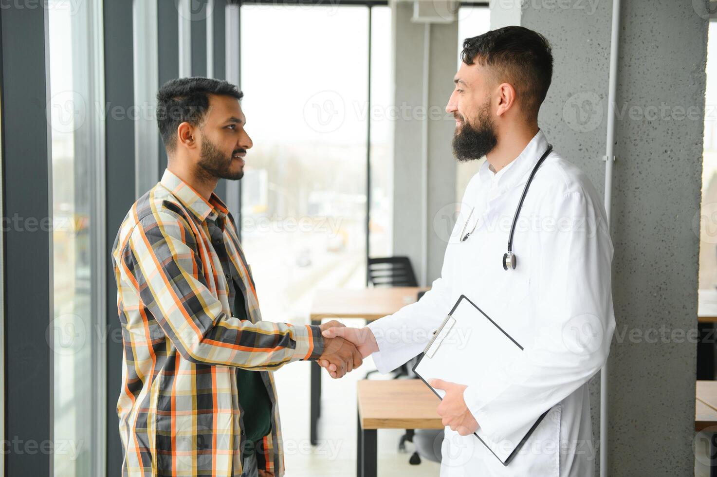 An Indian man is being examined by a doctor. Arab doctor. Health concept photo