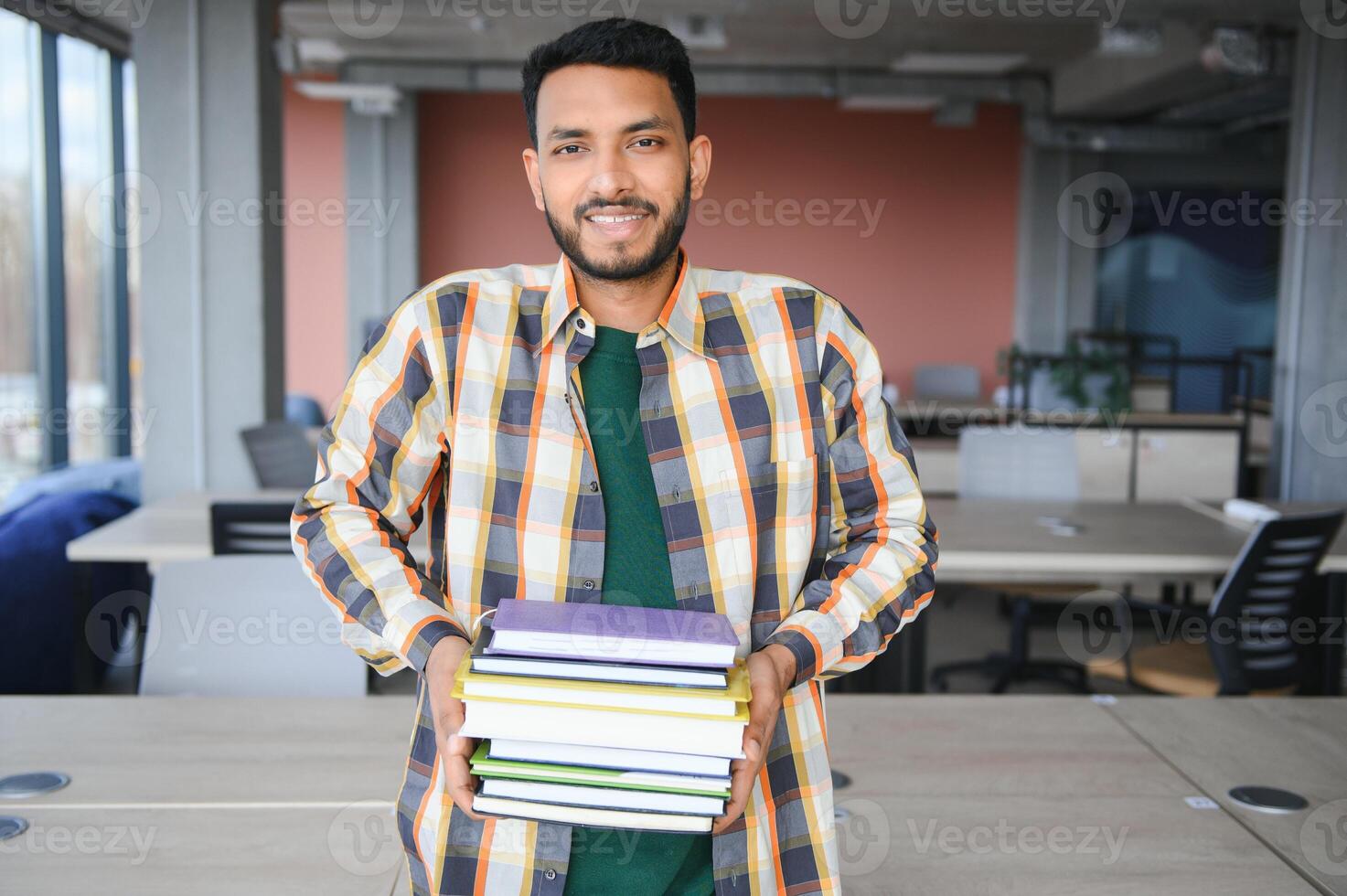 Handsome and young indian Male college student. photo