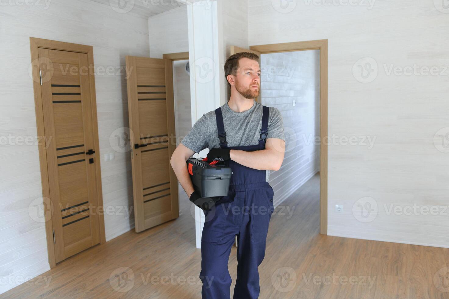 Process of construction new and modern modular house from composite sip panels. Worker man in special protective uniform wear working on building development industry of energy efficient property. photo