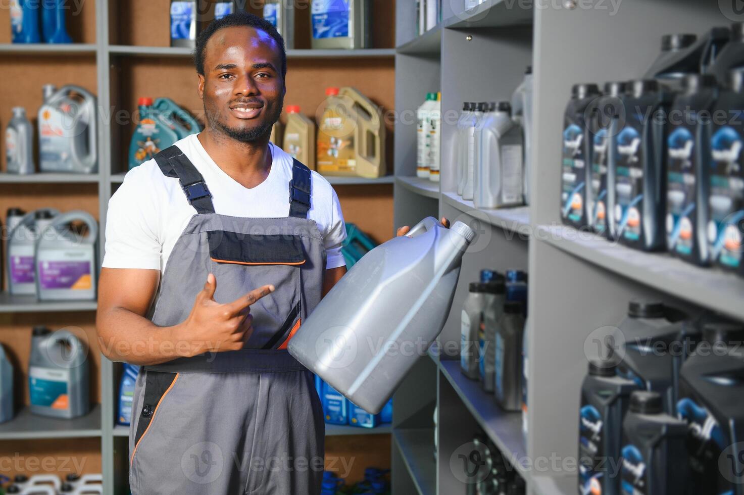 Smiling african Salesman Auto Parts Store photo