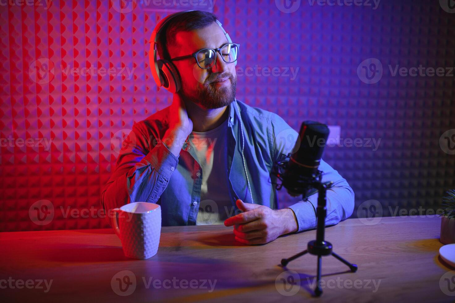 Young blogger with recording video photo