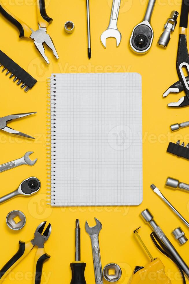 Set of various construction tools. Tools for home repair. Work at a construction site. On a yellow background. Flatly. Flatlay photo