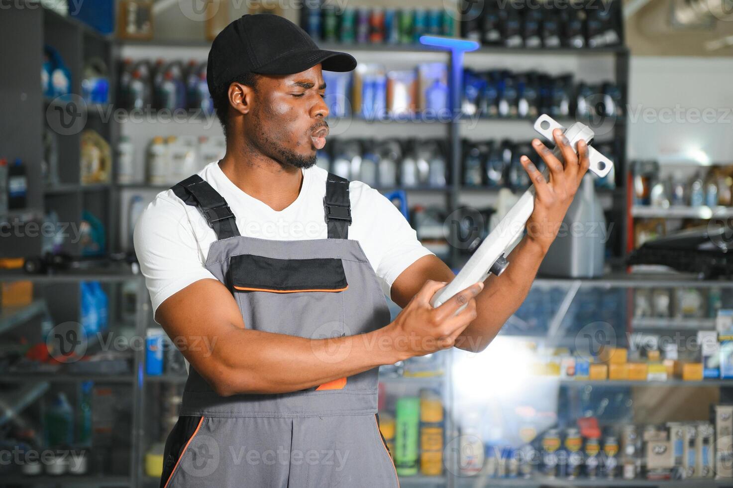 A salesman in an auto parts store photo