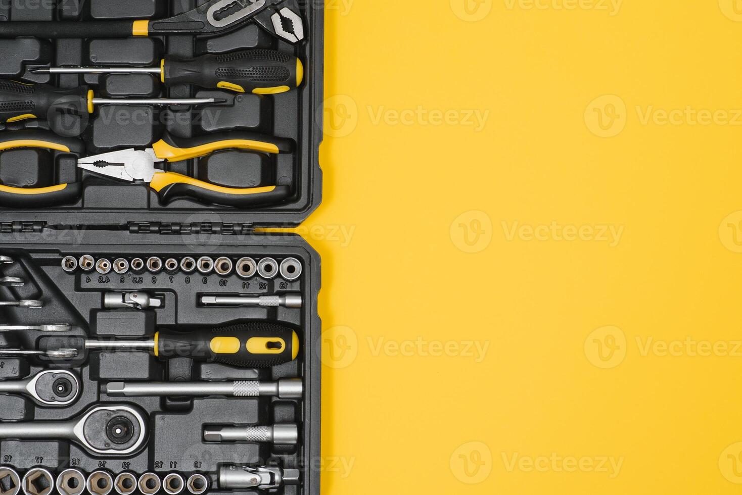 Set of various construction tools. Tools for home repair. Work at a construction site. On a yellow background. Flatly. Flatlay photo