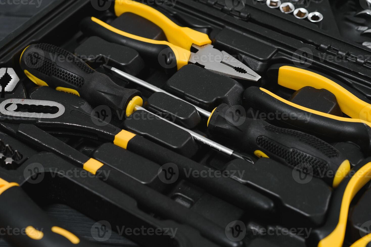 Box with set of tools for car repair, closeup. photo
