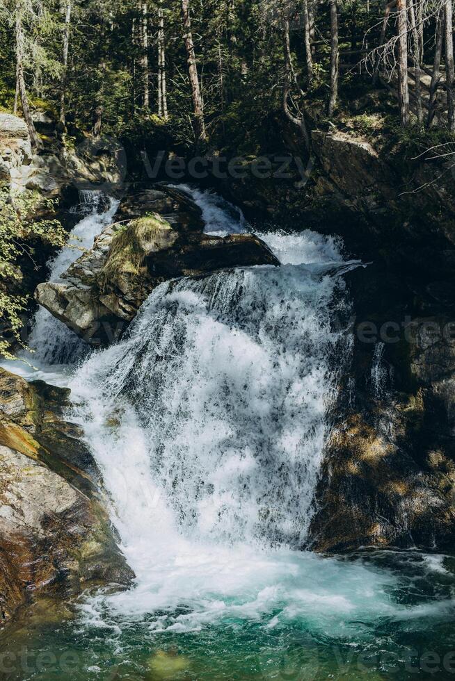 Waterfall in the Austrian Alps photo