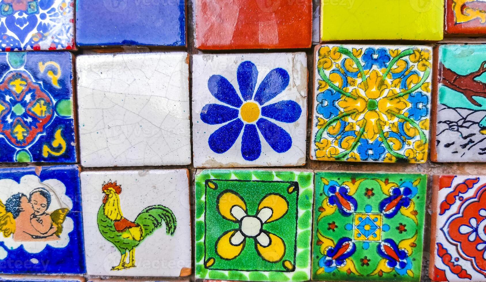 Beautiful colorful tiles with pictures in Puerto Escondido Mexico. photo