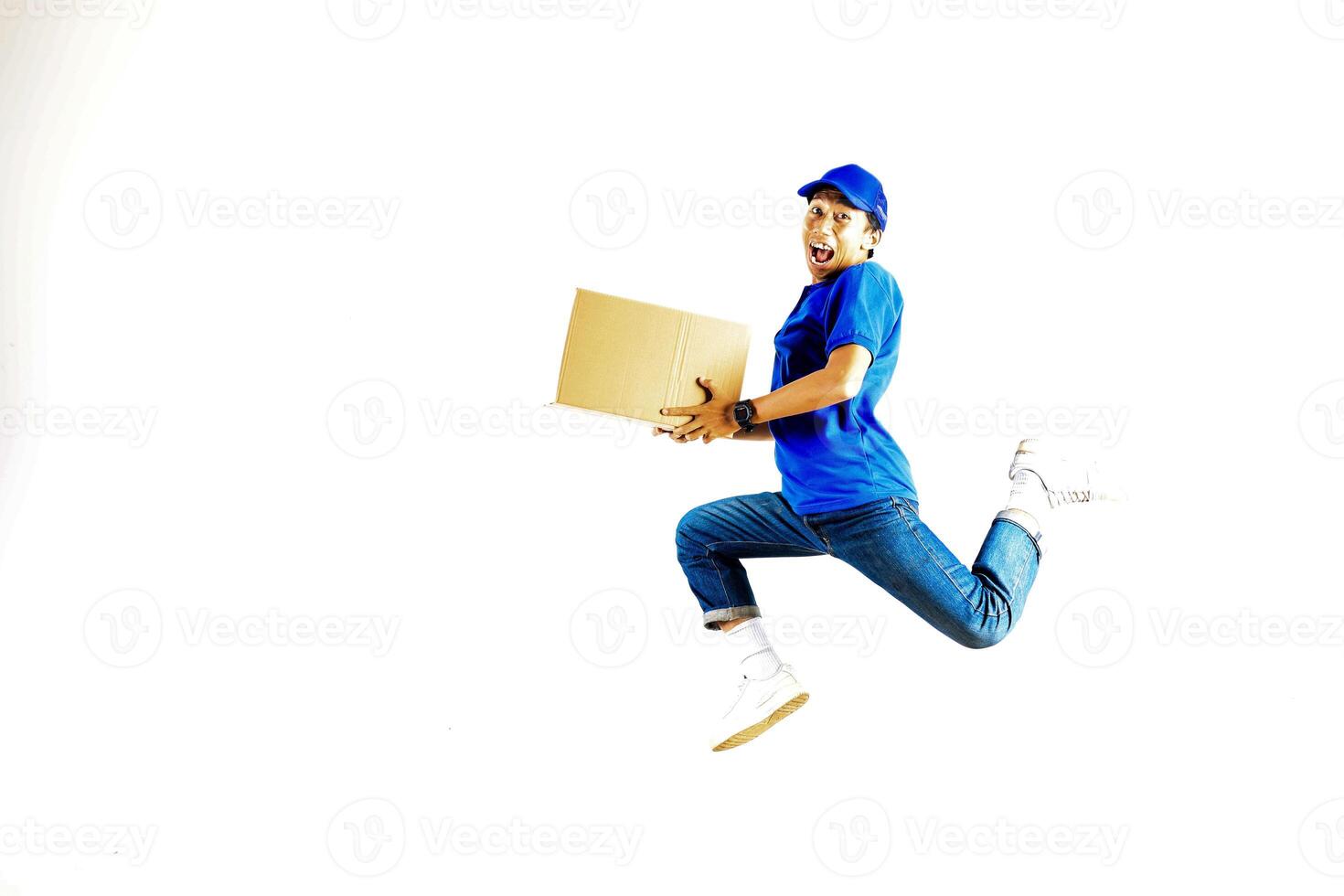 Asian Male Courier Hold Cardboard and Jumping photo