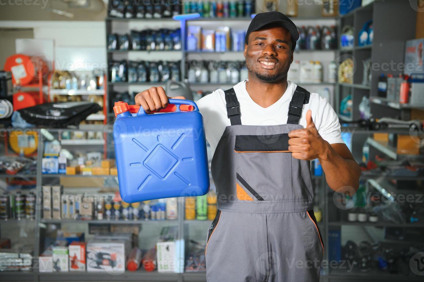 Smiling african Salesman Auto Parts Store photo