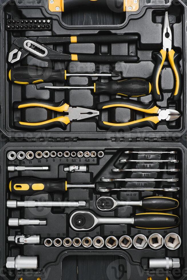 Set of tools for car repair in box, closeup. photo