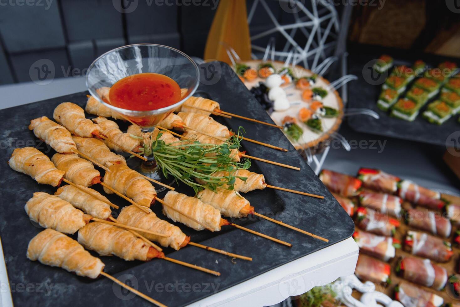 Meat and cheese appetizers. Antipasti and catering platter with different meat and cheese products. photo