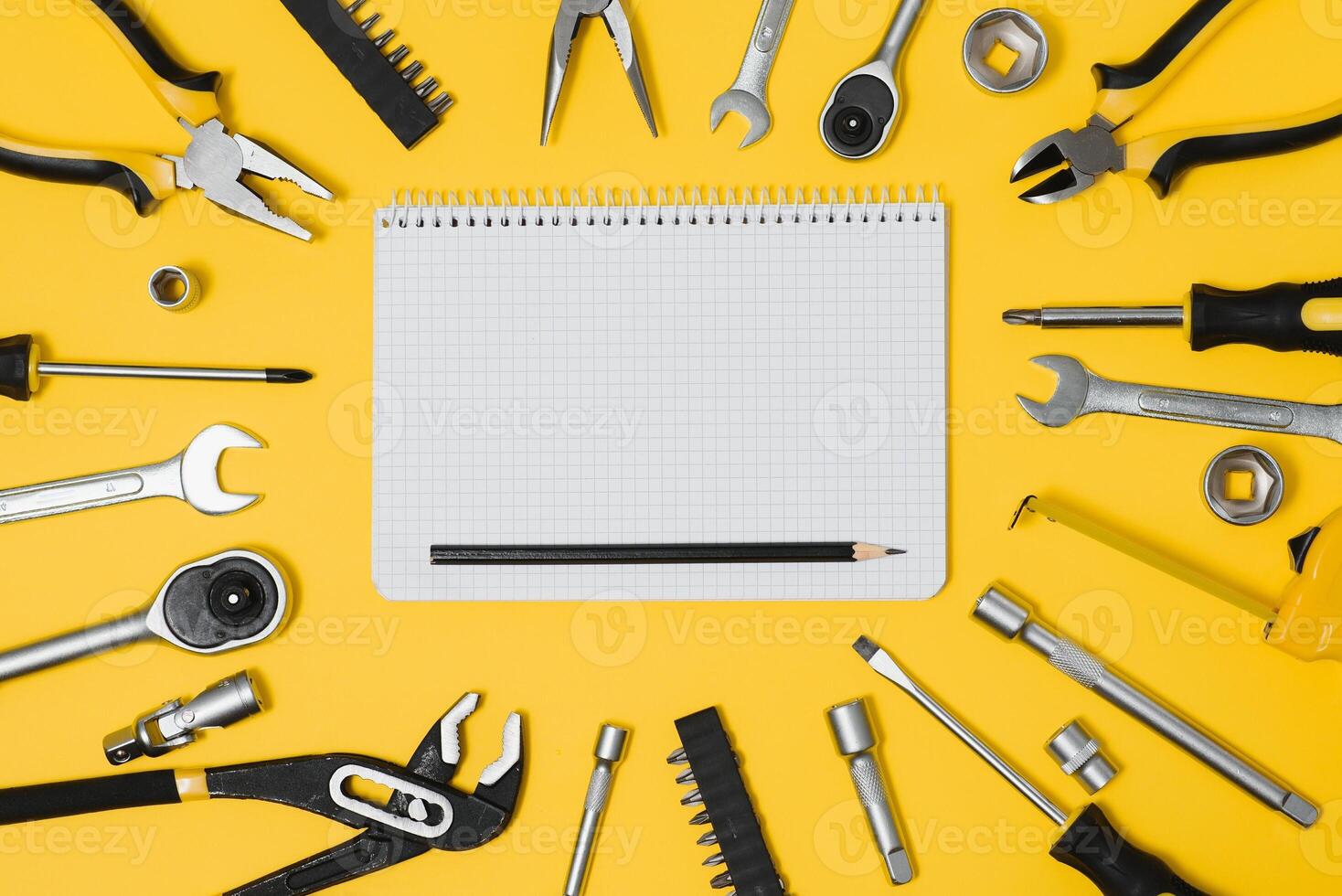 Set of various construction tools. Tools for home repair. Work at a construction site. On a yellow background. Flatly. Flatlay photo