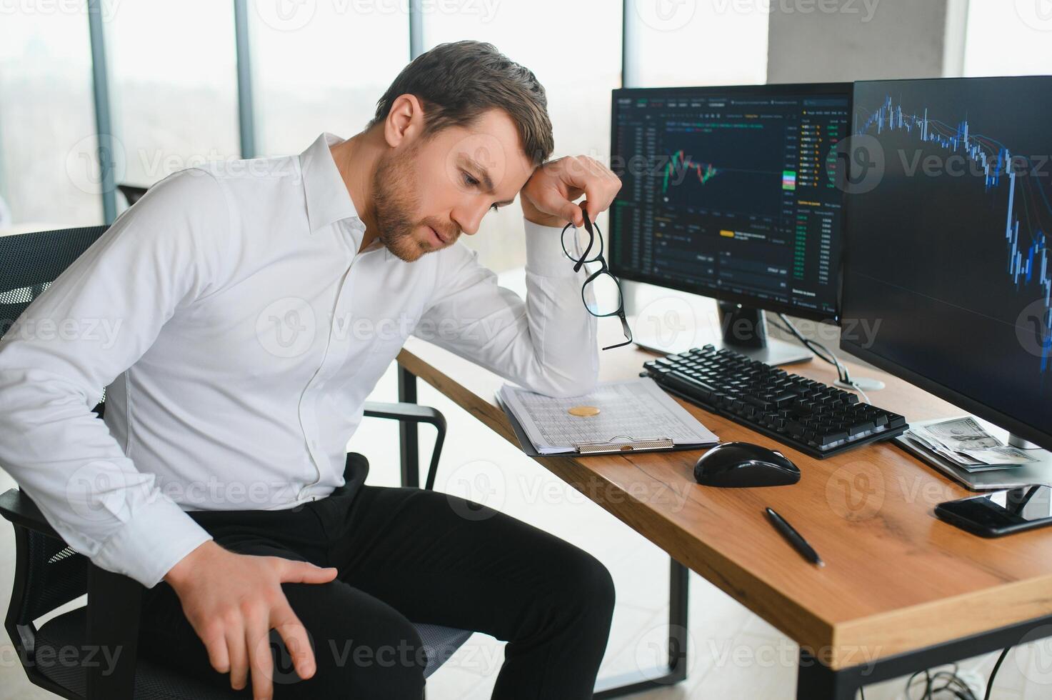 Stressed business man crypto trader broker investor analyzing stock exchange market crypto trading decreasing chart data fall down loss, desperate about losing money of crisis, recession, inflation. photo