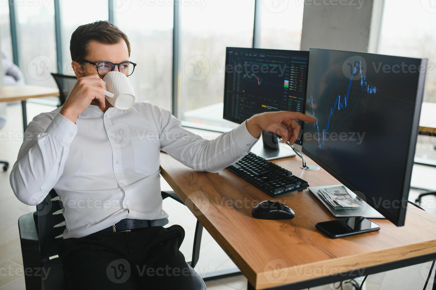 Successful trader in formalwear checking cryptocurrency information data on finance market graph, working in office photo