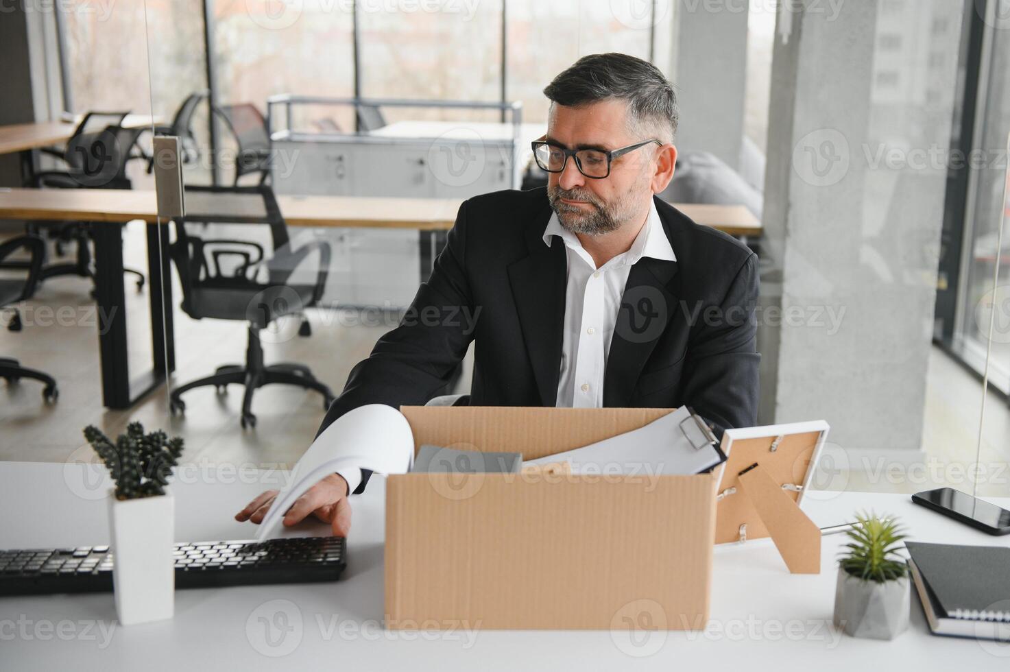 Old businessman employee in relocation concept photo