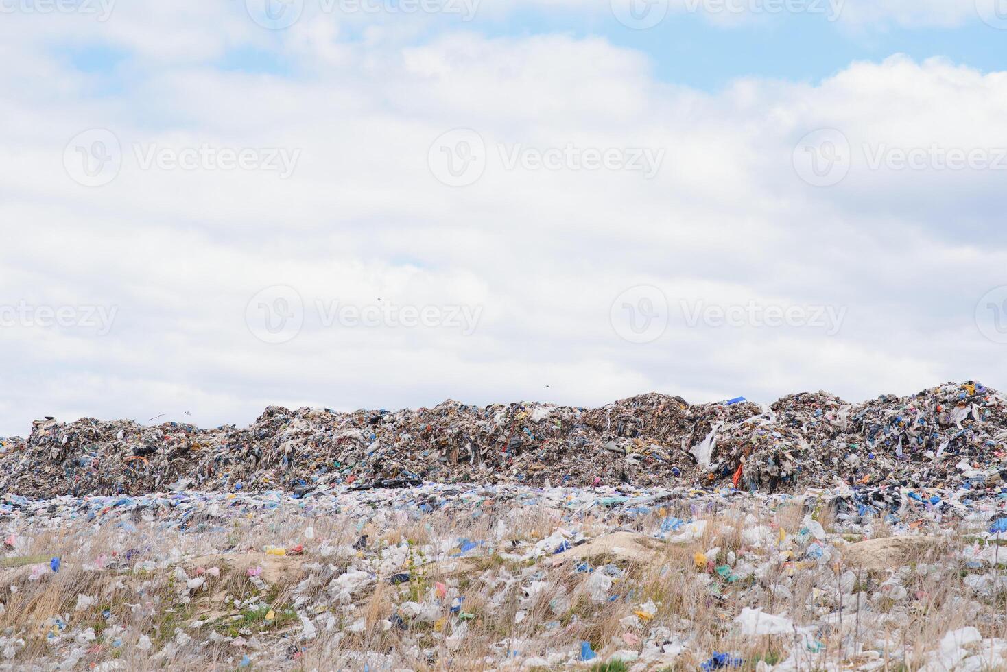 huge pile of garbage in a city dump on gloomy day. Keeping the environment clean. Ecological problems. photo