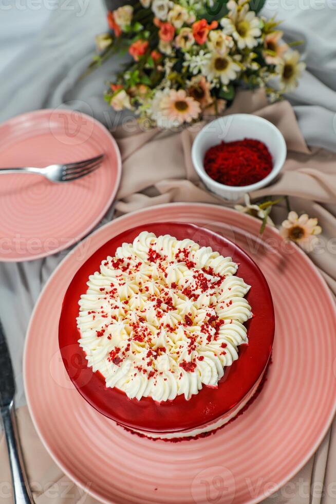 Premium Red Velvet cake include cream, sugar served on board isolated on napkin side view of cafe food photo