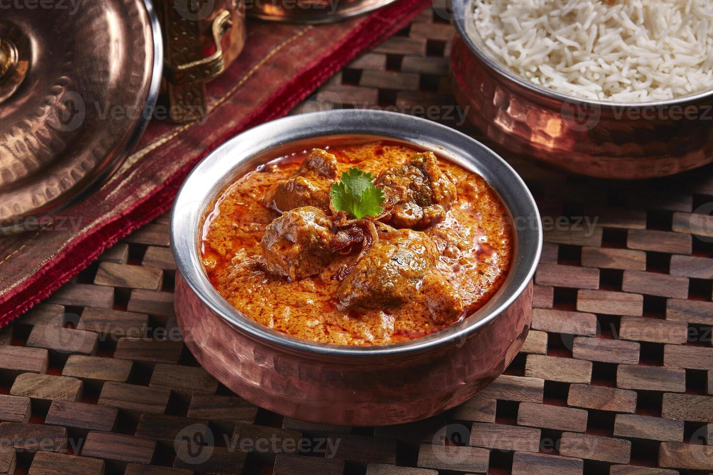 Lamb Rogan Gosht, mutton korma karahi with white rice served in dish isolated on table side view of middle east food photo