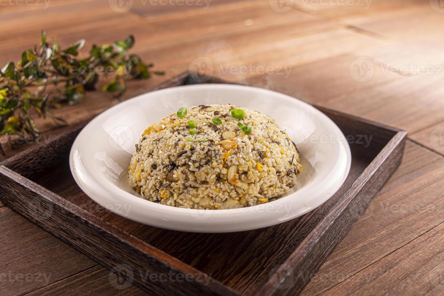 Fried Rice with Shrimp and Olive Vegetables served dish isolated on wooden table top view of Hong Kong food photo
