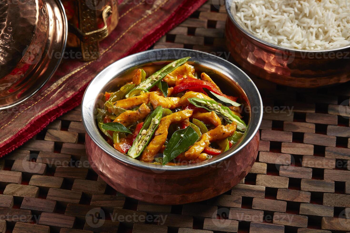 Chicken Chili with white rice served in dish isolated on table side view of middle east food photo