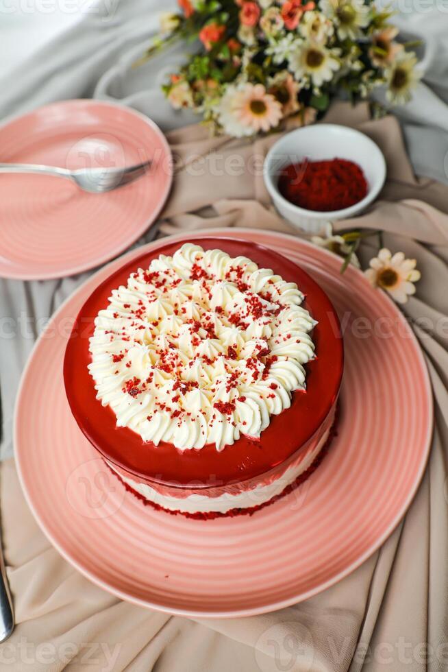 Premium Red Velvet cake include cream, sugar served on board isolated on napkin side view of cafe food photo