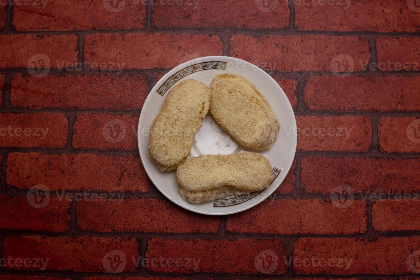 Sandwiches served in plate isolated on background top view of bangladeshi dessert food photo